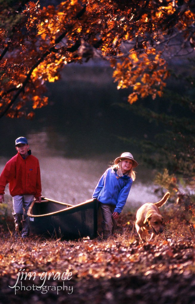 Kids and Dog out Canoeing