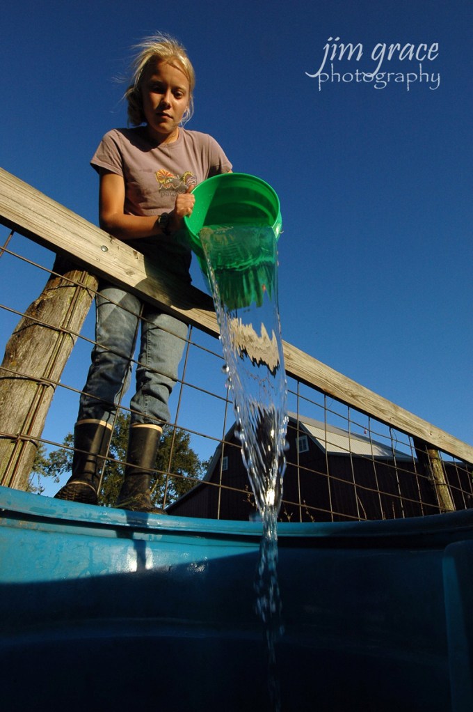 Young Girl Doing Farm Chores